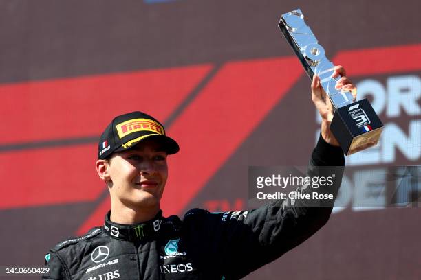 Third placed George Russell of Great Britain and Mercedes celebrates on the podium during the F1 Grand Prix of France at Circuit Paul Ricard on July...