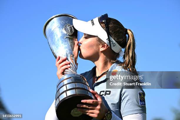 Brooke M. Henderson of Canada lift the trophy after winning the The Amundi Evian Championship during day four of The Amundi Evian Championship at...