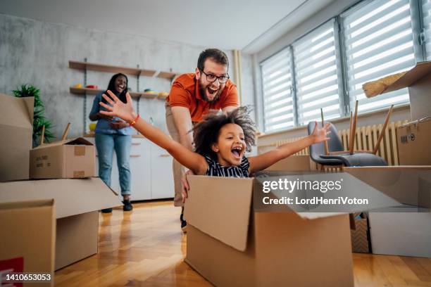 playing around while unpacking - verhuizen stockfoto's en -beelden