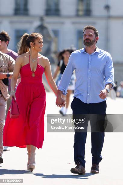 Jennifer Lopez and Ben Affleck are seen strolling near the Louvre Museum on July 24, 2022 in Paris, France.