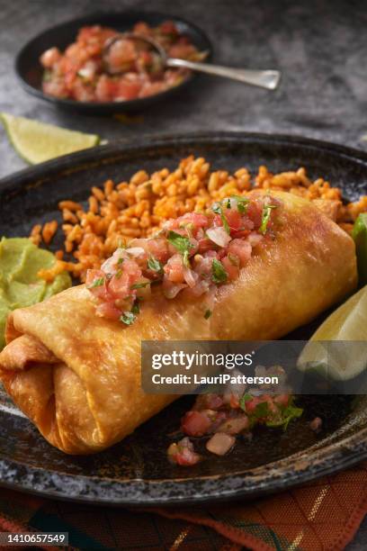 beef  chimichanga with mole sauce - fajita stock pictures, royalty-free photos & images