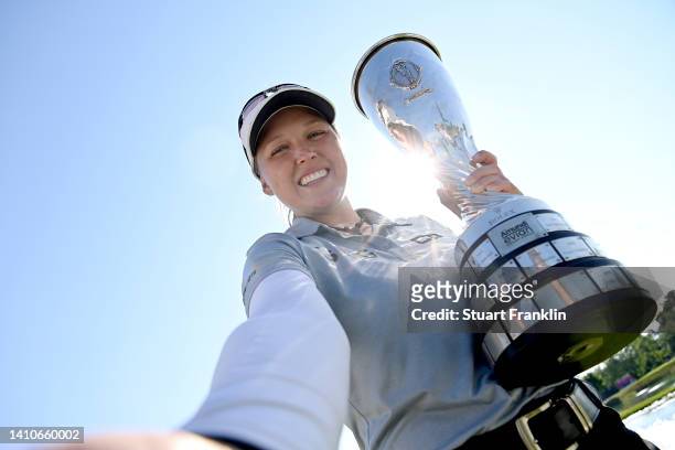 Brooke M. Henderson of Canada poses trophy after winning the The Amundi Evian Championship during day four of The Amundi Evian Championship at Evian...