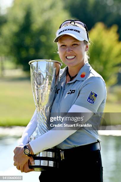 Brooke M. Henderson of Canada poses trophy after winning the The Amundi Evian Championship during day four of The Amundi Evian Championship at Evian...