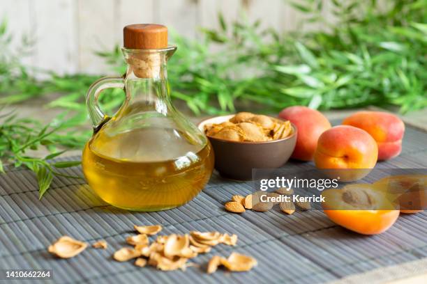 apricot kernel oil - apricot kernels with vitamin 17 - almond oil stock pictures, royalty-free photos & images