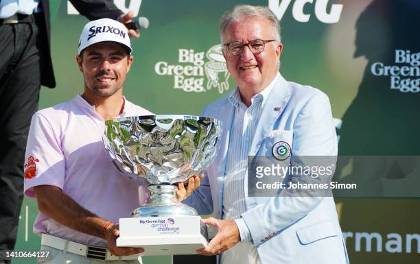 Alejandro del Rey of Spain is awarded by Achim Battermann , vice president of the German Golf associatin after winning the Big Green Egg German...