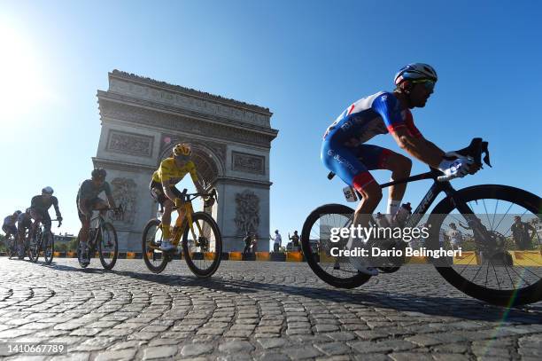 Jonas Vingegaard Rasmussen of Denmark and Team Jumbo - Visma Yellow Leader Jersey and Olivier Le Gac of France and Team Groupama - FDJ compete...