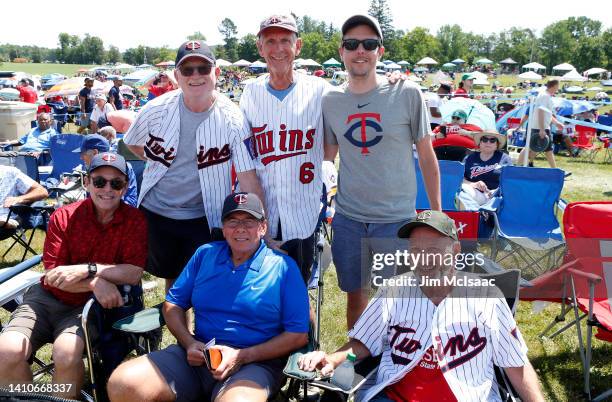 Minnesota Twins fans pose for a photograph as they attend the Baseball Hall of Fame induction ceremony in support of inductee's Tony Oliva and Jim...