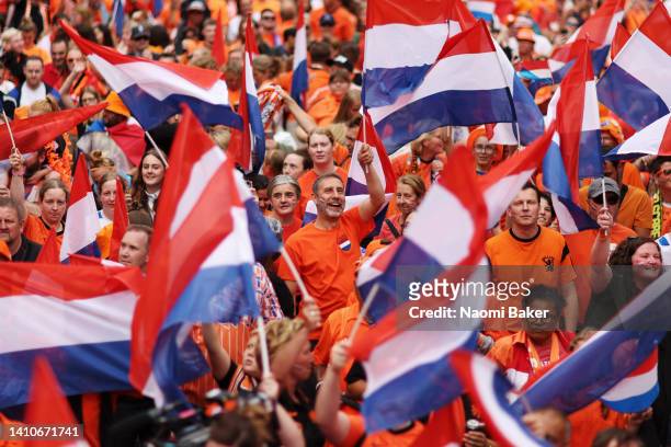 Fans of The Netherlands enjoy the fan march to the stadium during the UEFA Women's Euro England 2022 Quarter Final match between France and...