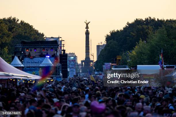 People participate in the annual Christopher Street Day parade and dance in the evening after a procession through the city between Brandenburg Gate...