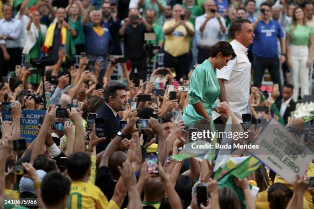 President of Brazil Jair Bolsonaro and his wife Michelle Bolsonaro attend during the Liberal Party national convention where he was officially...