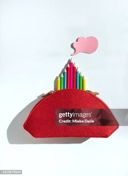 pencil case with colored pencils - colored pencil arrow stock pictures, royalty-free photos & images