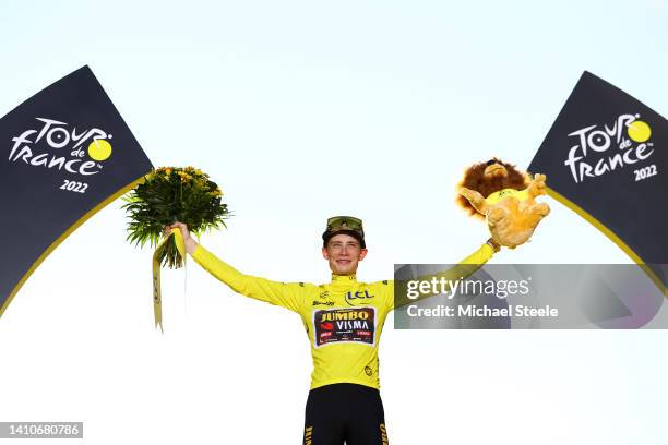 Jonas Vingegaard Rasmussen of Denmark and Team Jumbo - Visma celebrates winning the Yellow Leader Jersey on the podium ceremony after the 109th Tour...