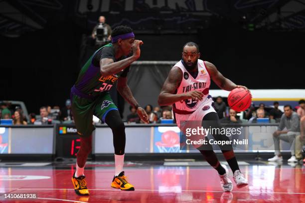 DaJuan Summers of the Tri-State dribbles against Quincy Miller of the 3 Headed Monsters during BIG3 Week Six at Comerica Center on July 24, 2022 in...