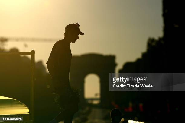 Silhouette of Geraint Thomas of The United Kingdom and Team INEOS Grenadiers on the podium during the medal ceremony after the 109th Tour de France...