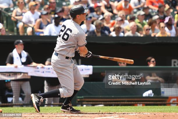 LeMahieu of the New York Yankees doubles in a run in the third inning during a baseball game against the Baltimore Orioles at Oriole Park at Camden...