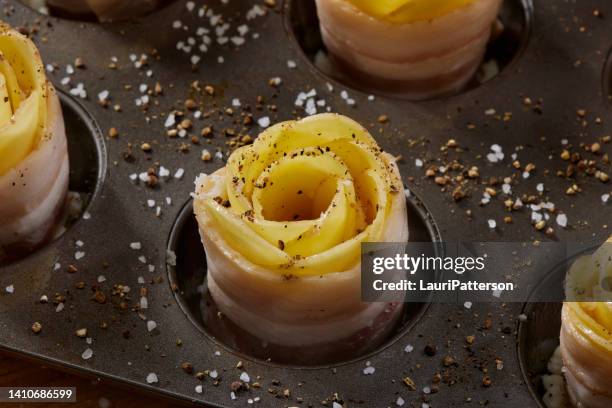 preparing potato roses wrapped in bacon - roses wrapped stock pictures, royalty-free photos & images