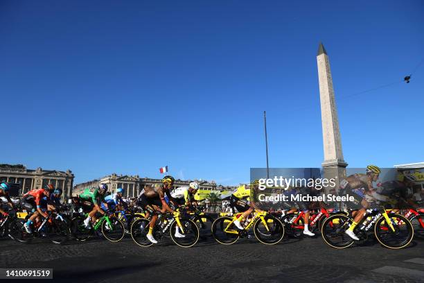 Jonas Vingegaard Rasmussen of Denmark and Team Jumbo - Visma - Yellow Leader Jersey and a general view of the peloton passing close to the Luxor...