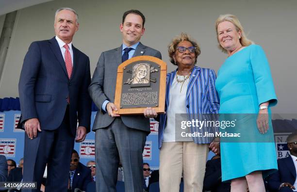 Dr. Angela Terry, niece of late inductee Buck O'Neil, poses for a photograph with, from left, MLB Commissioner Rob Manfred, Hall of Fame President...