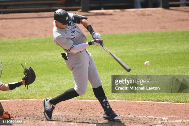 Aaron Judge of the New York Yankees gets broken bat single in the seventh inning during a baseball game against the Baltimore Orioles at Oriole Park...