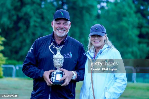 Darren Clarke of Northern Ireland poses with his wife Alison during Day Four of The Senior Open Presented by Rolex at The King's Course, Gleneagles...