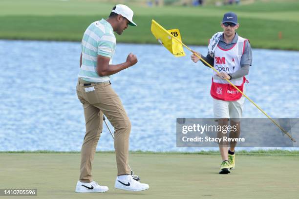 Tony Finau of the United States celebrates on the 18th green after winning the 3M Open at TPC Twin Cities on July 24, 2022 in Blaine, Minnesota.