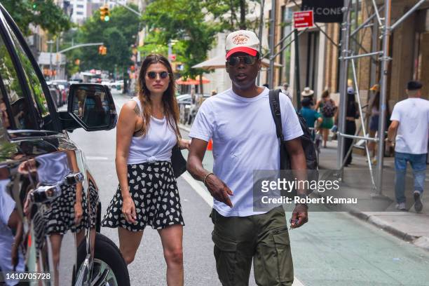 Lake Bell and Chris Rock are seen in Manhattan on July 24, 2022 in New York City.