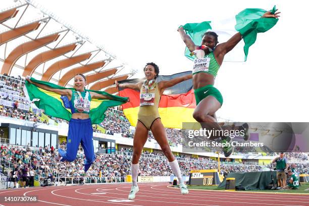 Bronze medalist Leticia Oro Melo of Team Brazil, gold medalist Malaika Mihambo of Team Germany, and silver medalist Ese Brume of Team Nigeria...