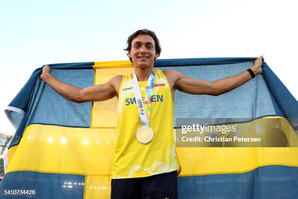 Armand Duplantis of Team Sweden celebrates after setting a world record and winning gold in the Men's Pole Vault Final on day ten of the World...