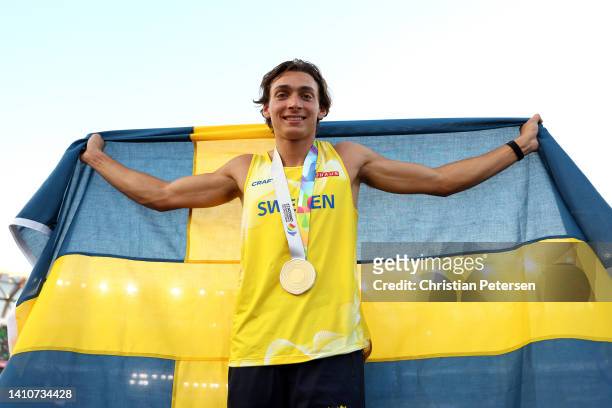 Armand Duplantis of Team Sweden celebrates after setting a world record and winning gold in the Men's Pole Vault Final on day ten of the World...