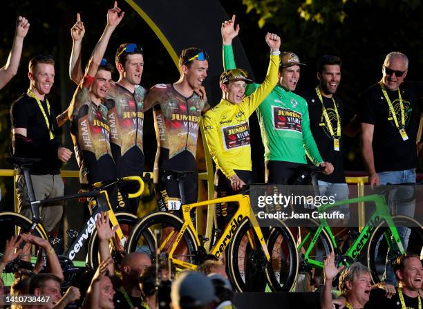 Winner of the Tour 2022, Yellow jersey Jonas Vingegaard of Denmark and Jumbo - Visma, winner of the Green jersey for best sprinter Wout van Aert of...