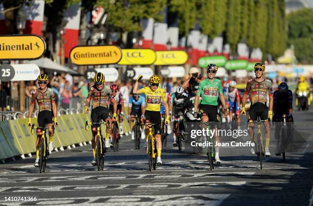 Sepp Kuss of USA and Jumbo - Visma, Tiesj Benoot of Belgium and Jumbo - Visma, race leaders yellow jersey Jonas Vingegaard of Denmark and Jumbo -...