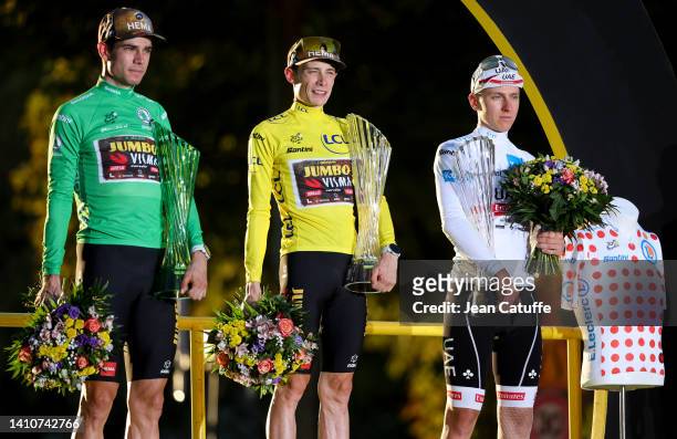 Winner of the Green jersey for best sprinter Wout van Aert of Belgium and Jumbo - Visma, winner of the Tour 2022, Yellow jersey Jonas Vingegaard of...