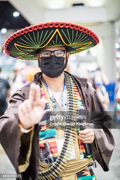 Star Wars mashup cosplayer Christian Bastidas as Obi-Juan Kenobi poses for photos during 2022 Comic-Con International Day 4 at San Diego Convention...