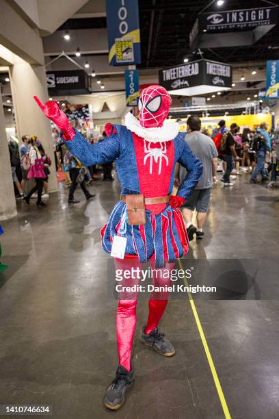 Cosplayer Stephen Eckert poses for photos in a Shakespeare inspired Spiderman costume during 2022 Comic-Con International Day 4 at San Diego...