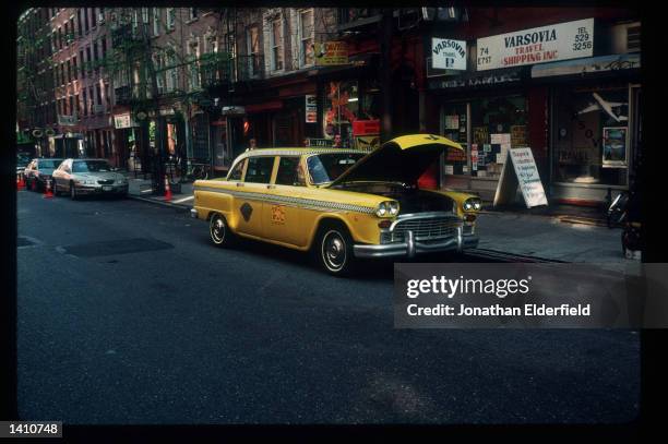 Checkered cab is parked in the Ukrainian section of the East Village June 1, 1998 in New York City. Populated by residents of numerous heritages...