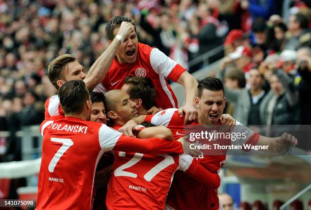 Players of Mainz celebrates after Nicolai Mueller is scoring his teams first goal during the Bundesliga match between FSV Mainz 05 and 1.FC Nuernberg...