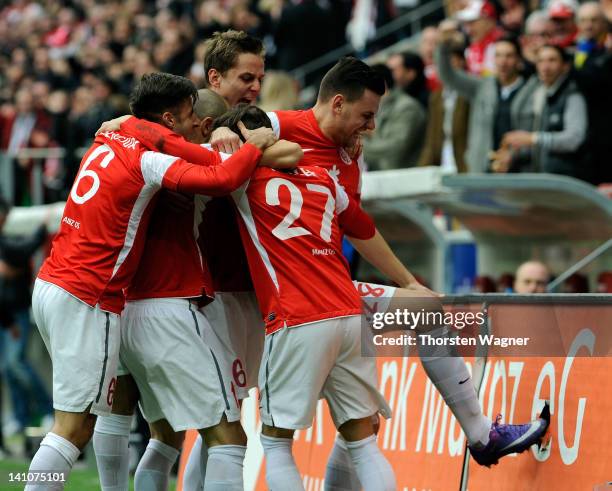Players of Mainz celebrates after Nicolai Mueller is scoring his teams first goal during the Bundesliga match between FSV Mainz 05 and 1.FC Nuernberg...