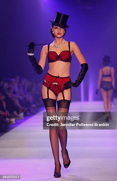 Model showcases designs by Von Folies by Dita Von Teese on the runway during L'Oreal Melbourne Fashion Festival on March 10, 2012 in Melbourne,...