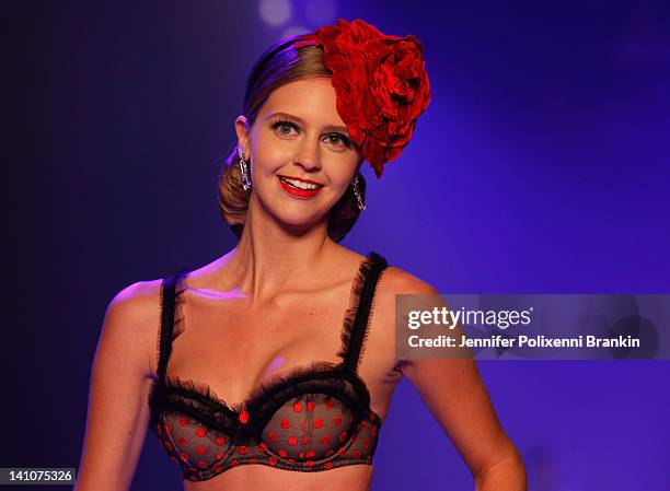 Model showcases designs by Von Folies by Dita Von Teese on the runway during L'Oreal Melbourne Fashion Festival on March 10, 2012 in Melbourne,...