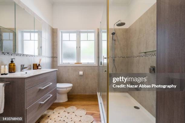 designed bathroom in modern home. - kondo photography stock pictures, royalty-free photos & images