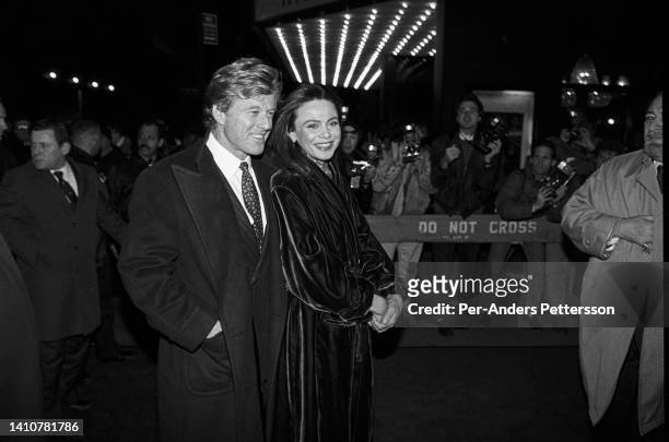 Movie stars Robert Redford and Lena Olin arrives at the premiere of the movie Havana outside Ziegfeld Theater on December 12, 1990 in New York, NY,...