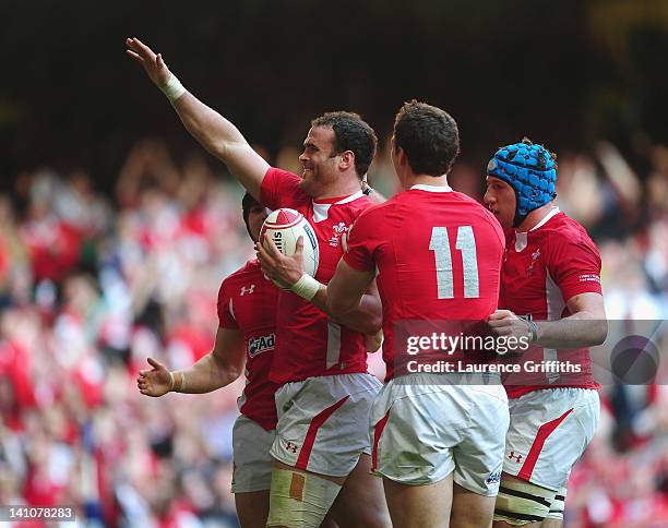 Jamie Roberts of Wales is congratulated on his second half try during the RBS Six Nations match between Wales and Italy at Millenium Stadium on March...