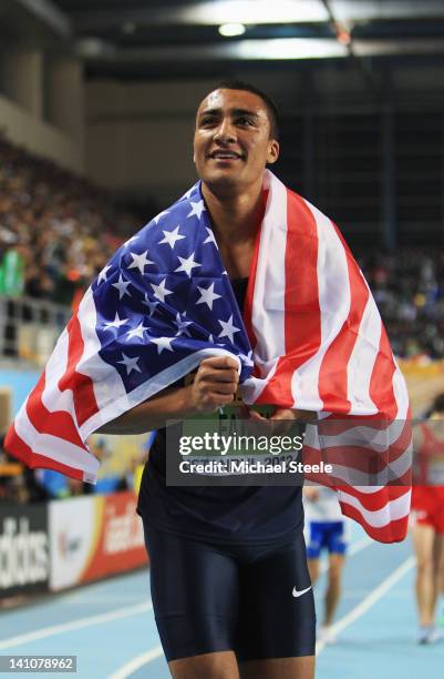 Overall gold medalist Ashton Eaton of the United States celebrates after the Men's 1000 Metres in the Heptathlon during day two of the 14th IAAF...