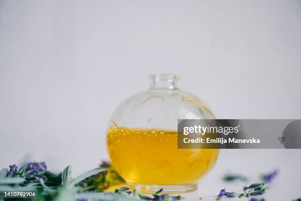 aromatic oils with lavender flowers - mineral oil stock pictures, royalty-free photos & images