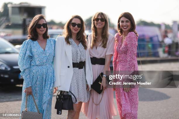 Patricia Wirschke, Alexandra Lapp, Isabel Lapp and Ira Meindl attends the Riani Fashion Festival on July 23, 2022 in Dusseldorf, Germany.