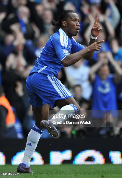 Didier Drogba of Chelsea celebrates the opening goal during the Barclays Premier League match between Chelsea and Stoke City at Stamford Bridge on...