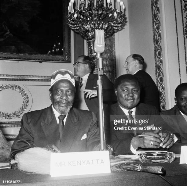 Kenyan politician and anti-colonial activist Jomo Kenyatta and Kenyan politician, independence activist and trade unionist Tom Mboya attend the Kenya...