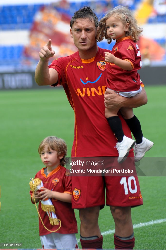 Francesco Totti and his wife Ilary Blasi with their children Cristian and Chanel