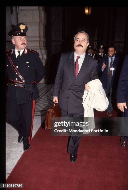 Italian magistrate Giovanni Falcone while walking. Rome , 1990s.