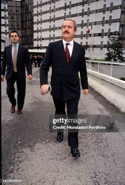 Italian magistrate Giovanni Falcone while walking. Rome , 1990s.